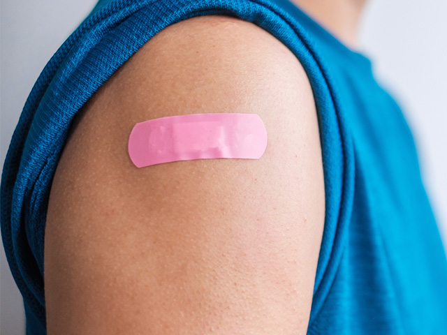 bandage on a persone's arm